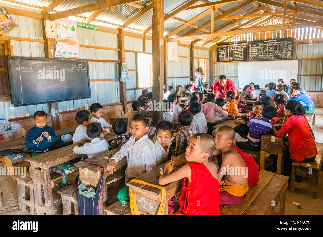 School children sitting at their desks, classroom, Shan State, Myanmar Stock Photo