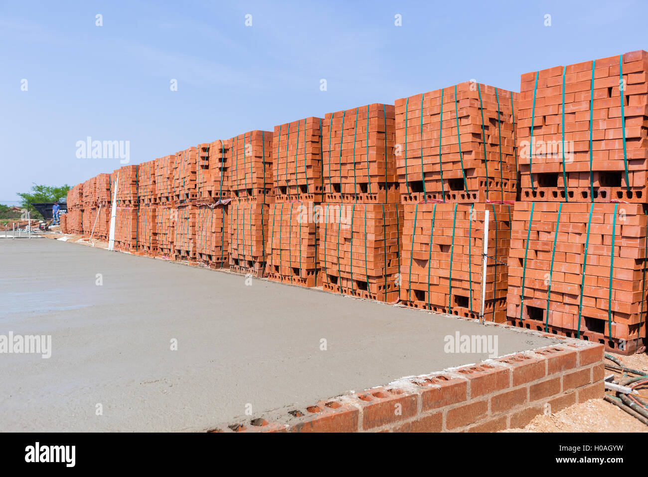 Construction building concrete pouring wet cement stone wire plastic