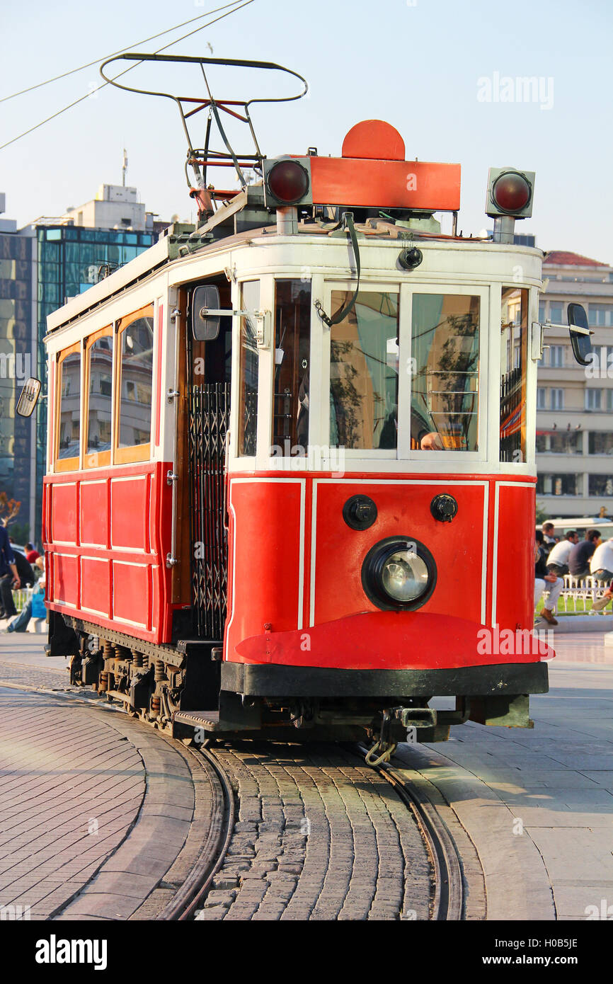 Red vintage tram on Taksim square in Istanbul, Turkey Stock Photo