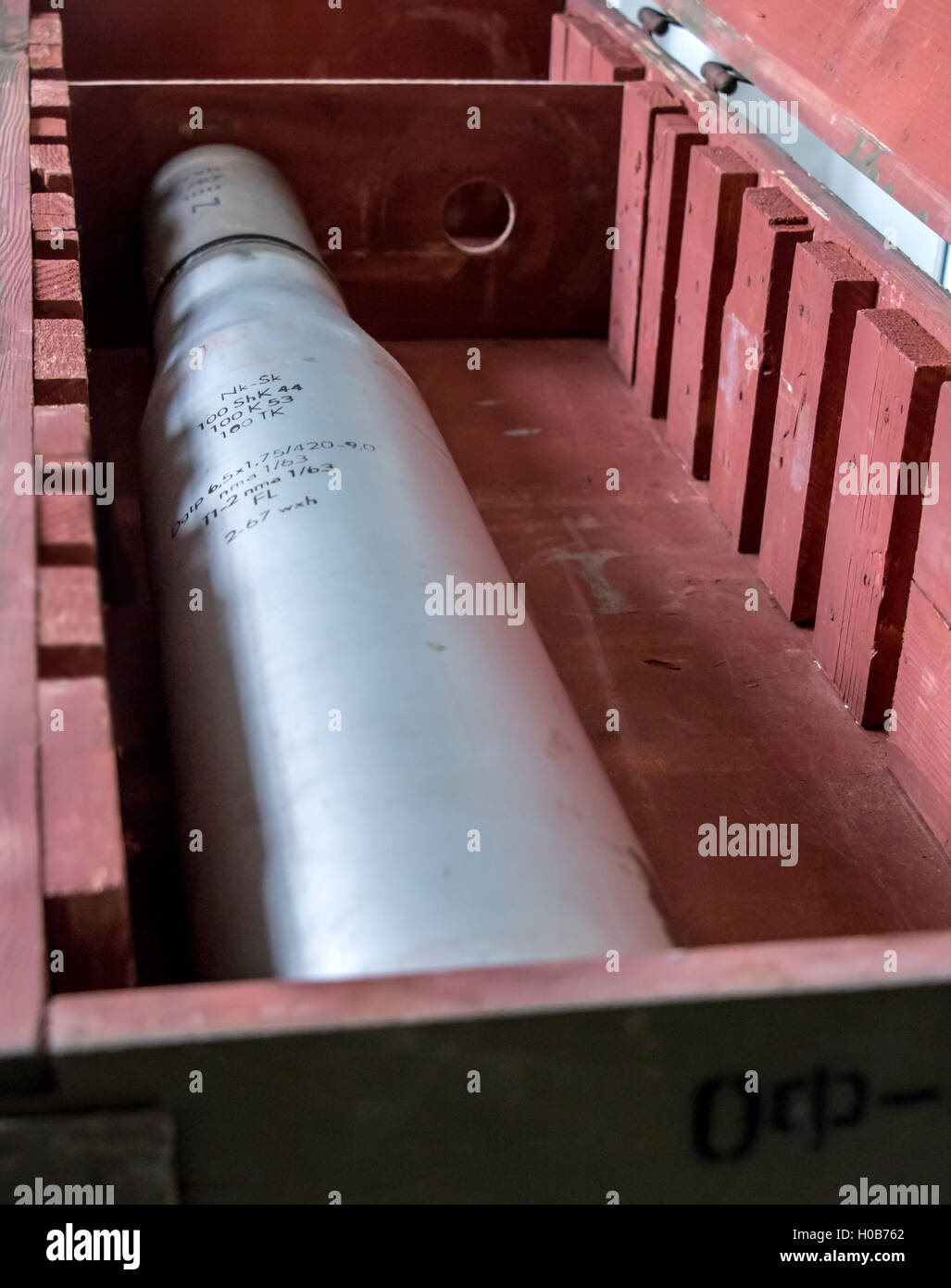artillery charge caliber 100mm for tank T 54 inside wooden container Stock Photo