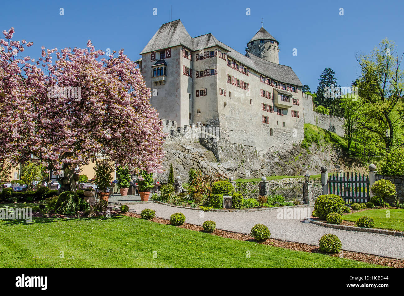 Matzen Castle, now a Hotel in Tyrol, on the well protected hill of Matzen was already a residential place in the Bronze Age. Stock Photo