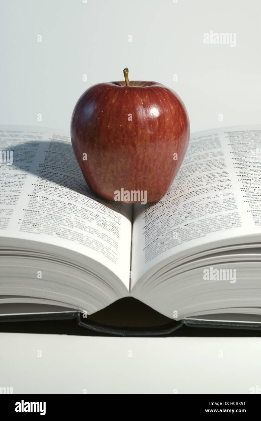 Apple on Dictionary Stock Photo Alamy