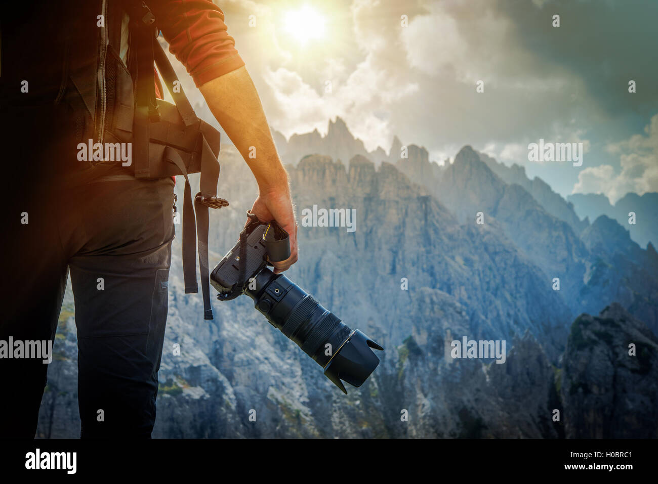 Nature Photography Concept. Professional Nature Photographer and the Mountain Vista. Stock Photo
