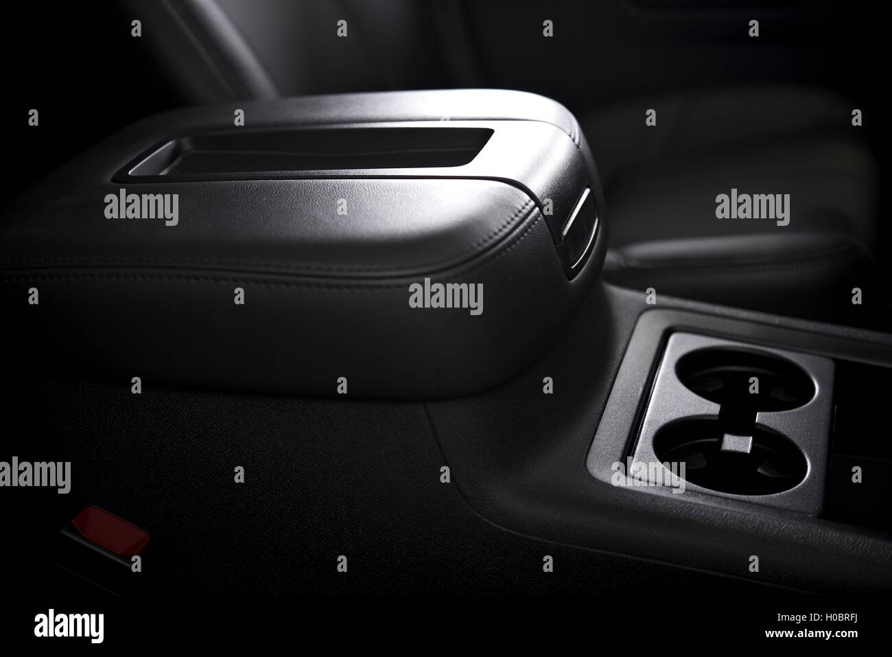 Clean Car Interior Closeup. Car Cup Holders and Arm Rest Details Stock