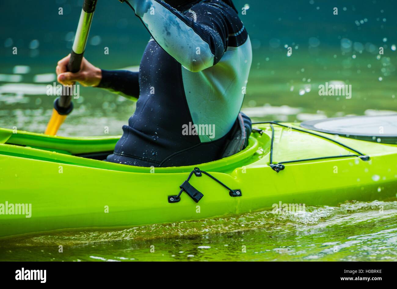 Recreational Lake Kayaking Closeup Photo. Kayak Paddling in Action