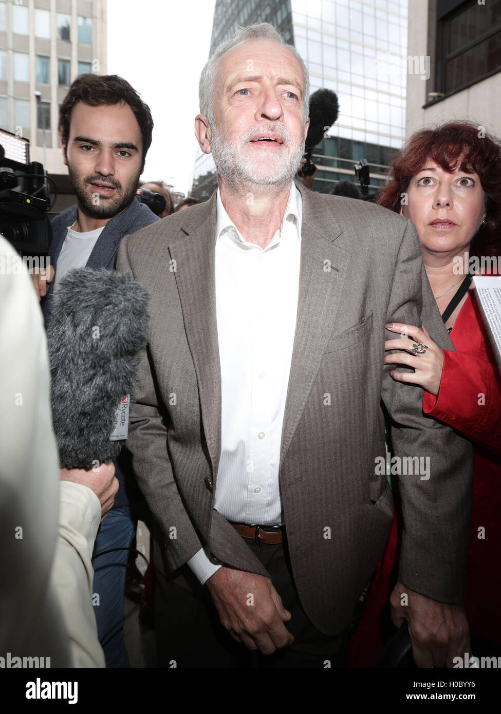Labour Party leader Jeremy Corbyn arrives at Labour Party HQ in Westminster, London, where the party's ruling National Executive Committee is meeting to discuss moves to restore party unity amid warnings of an early general election in which leadership contender Owen Smith has predicted they could be 'decimated'. Stock Photo