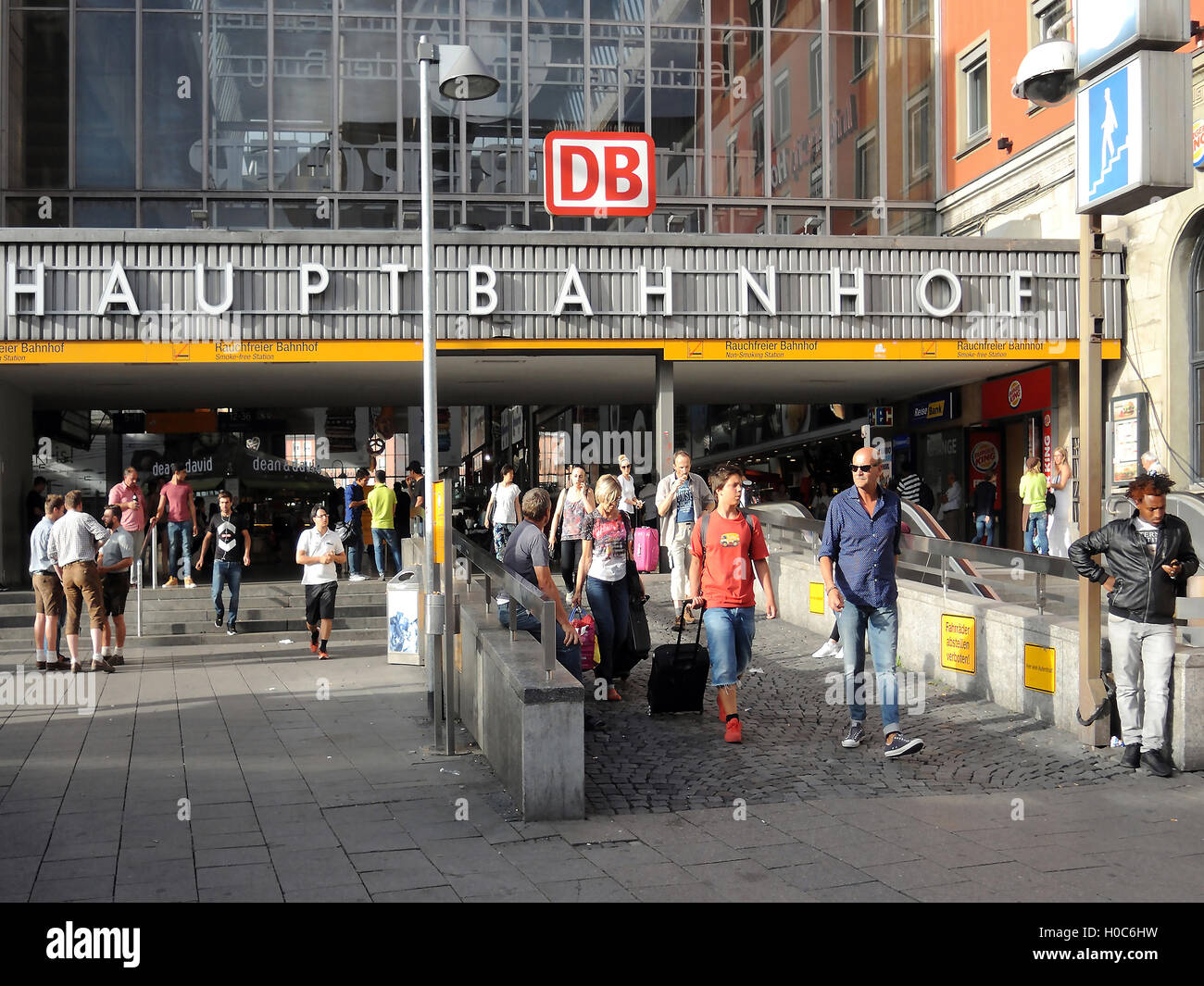 Central Station of Munich in Germany with people outside of the entrance area. Stock Photo