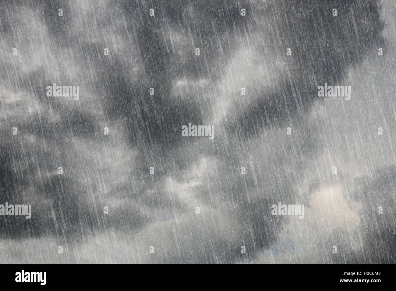 dark storm clouds with falling rain Stock Photo - Alamy