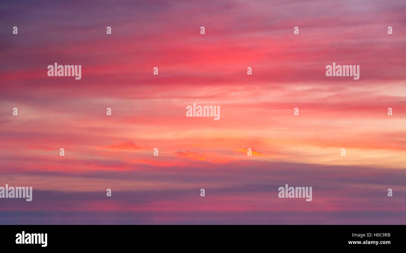 Sunset sky with red clouds Stock Photo - Alamy