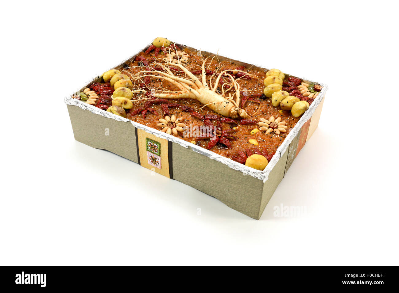 Traditional Korean snack made of a mixture of jujube, chestnuts, pine nuts or Short sangtteok Yakbap also called Stock Photo