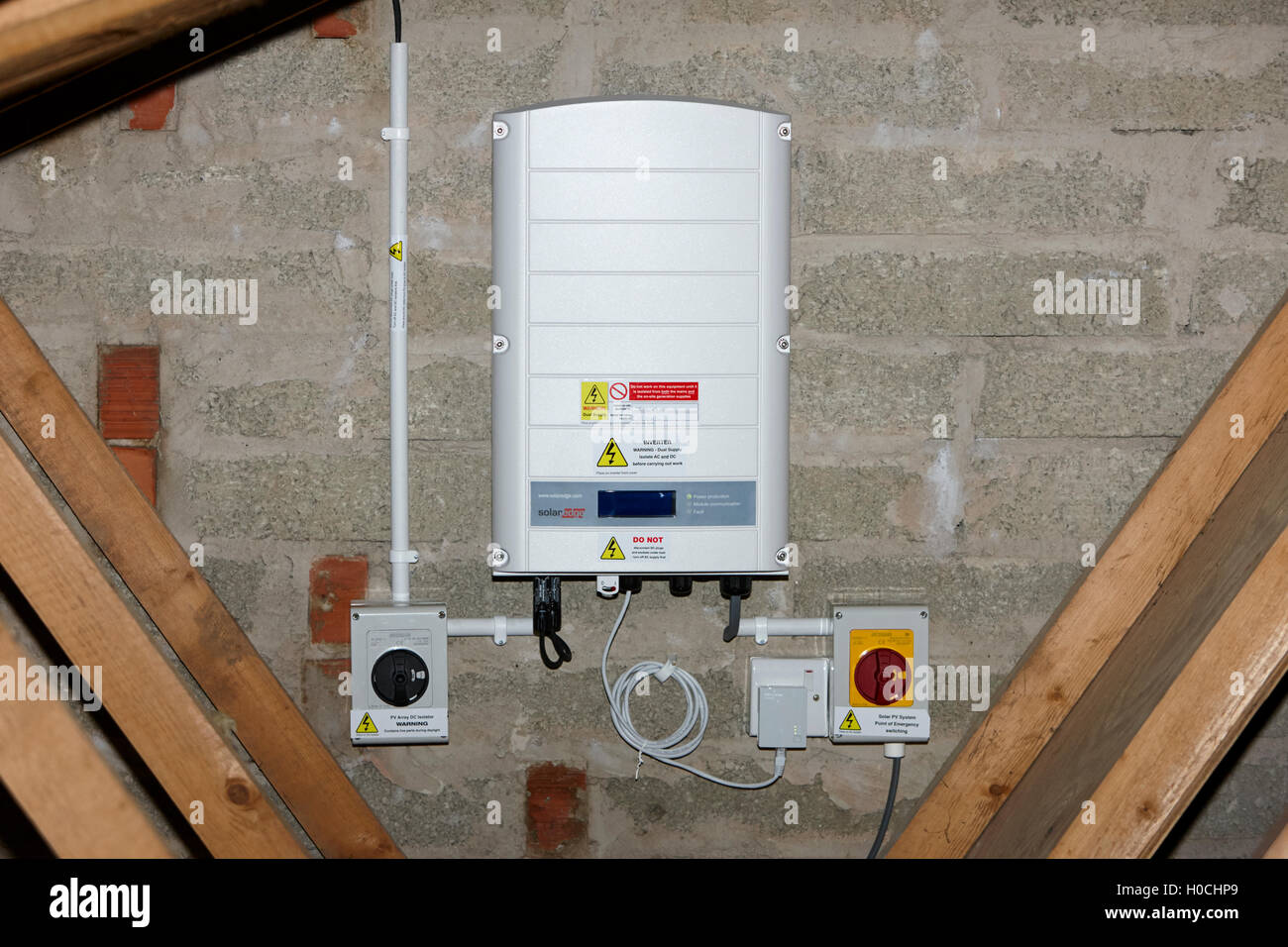 solaredge inverter in a domestic solar panel installation in the uk Stock Photo
