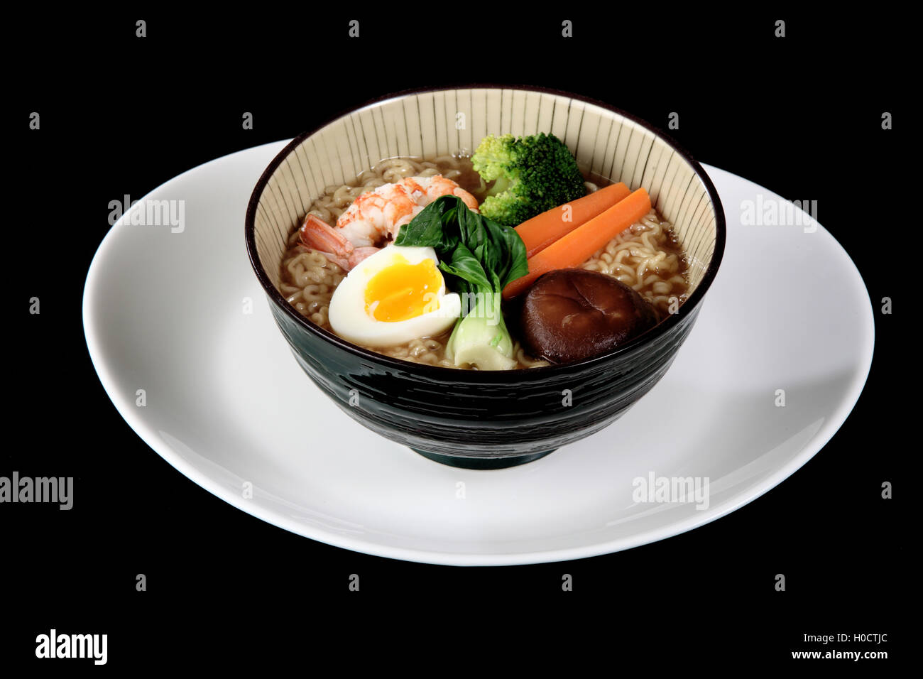dish of Japanese cuisine meat, rice, fish and vegetables Stock Photo