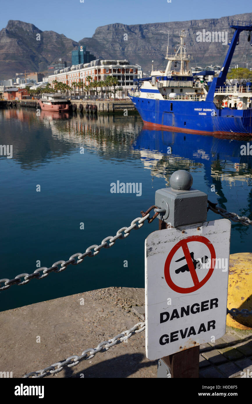 No swimming allowed sign at the water's edge at the Victoria & Alfred Waterfront ,  Cape Town , South Africa. Stock Photo