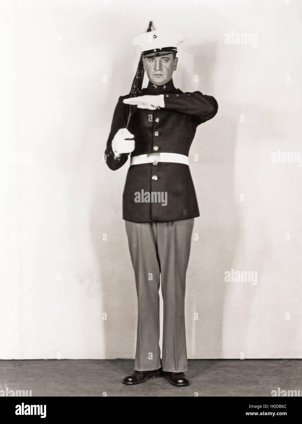 Full length portrait of marine standing at attention Stock Photo