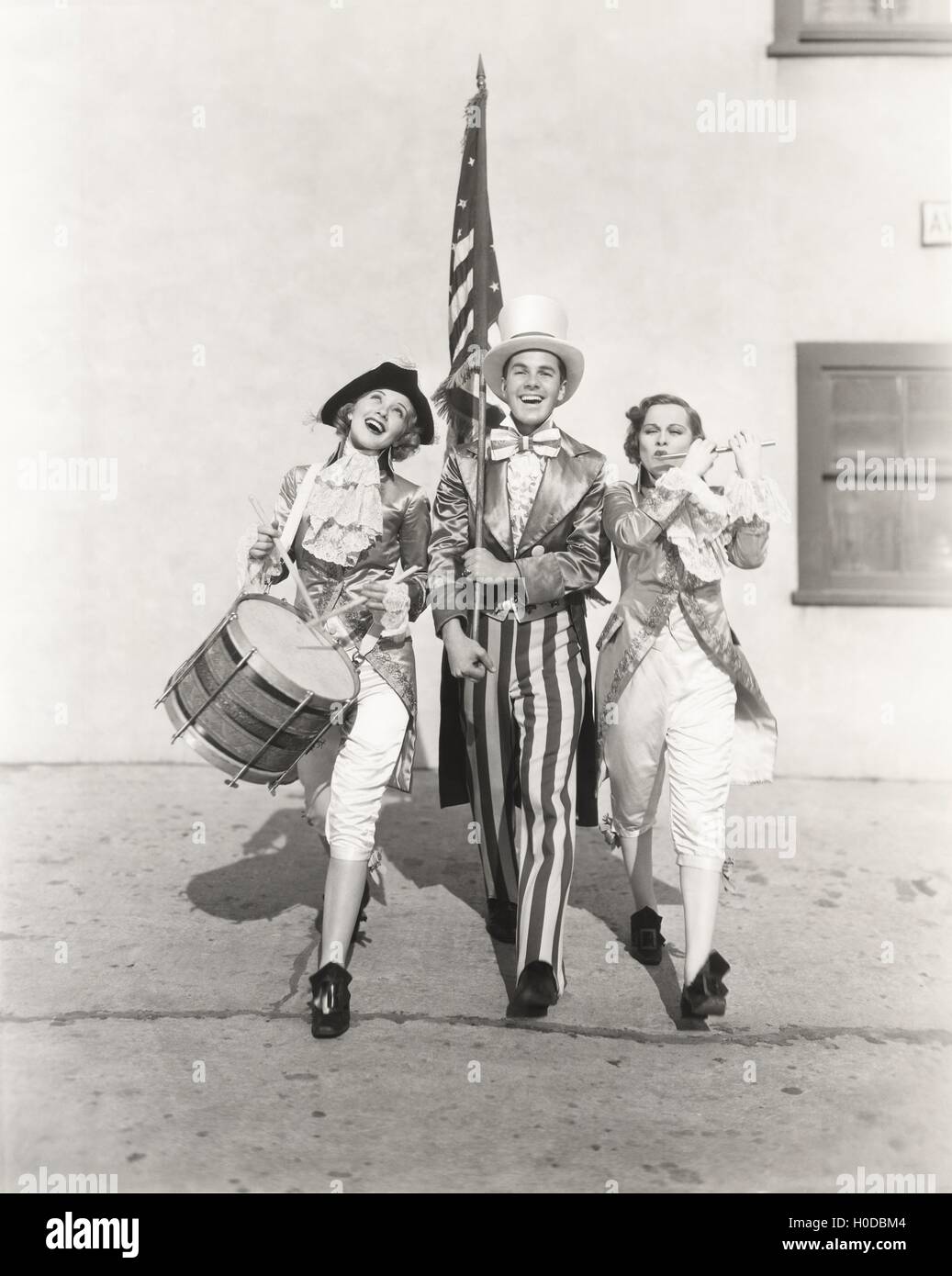 People in 18th century costumes celebrating independence day Stock Photo