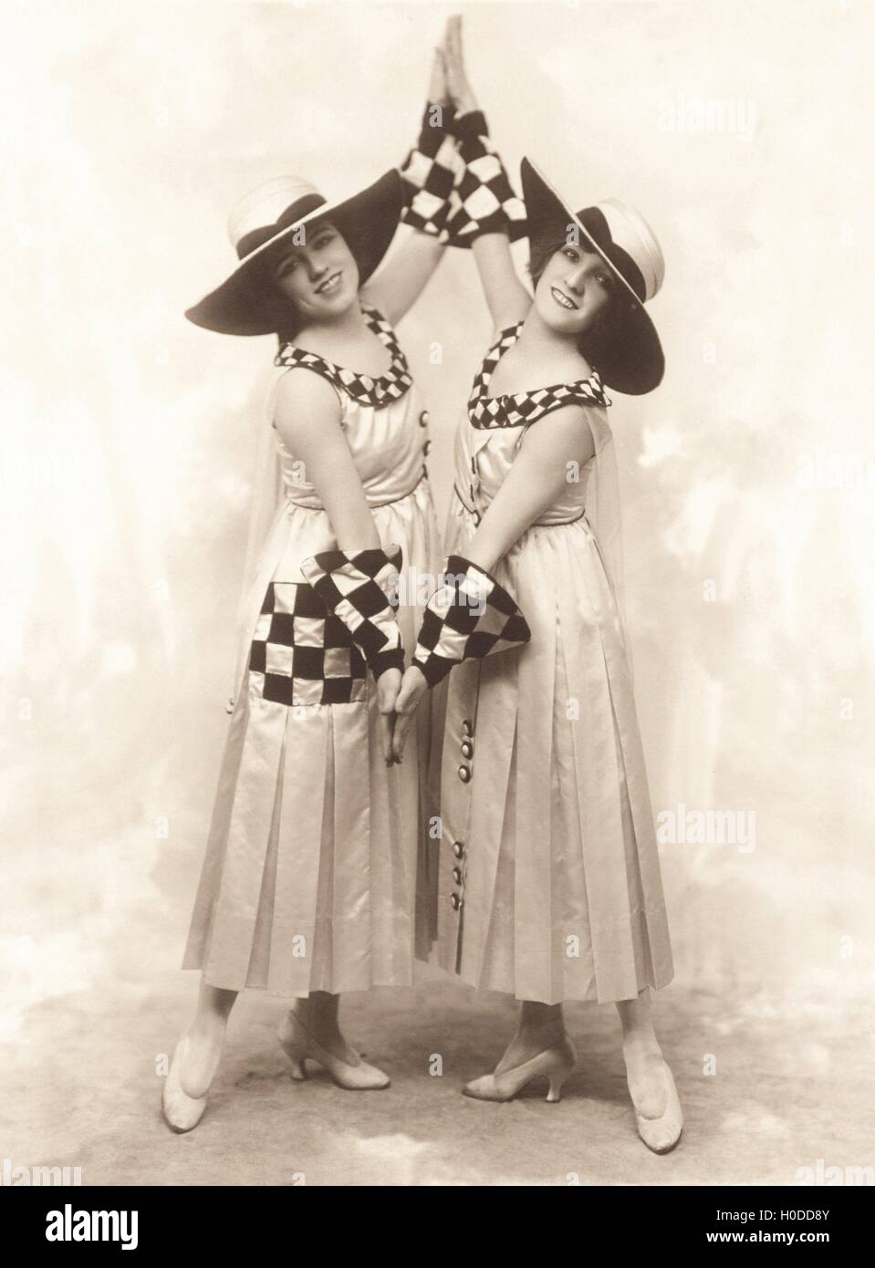 Full length of smiling female dancers performing on stage Stock Photo