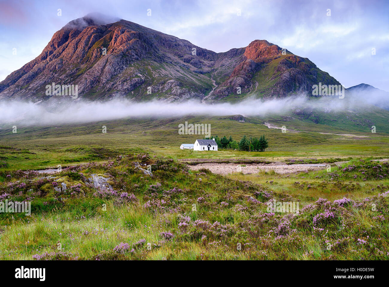 Sunrise over the mountain tops at Glencoe in the Scottish Highlands Stock Photo