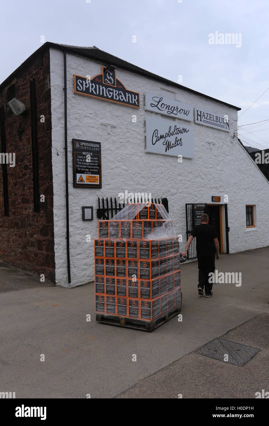 Worker Moving Pallet Of Springbank 10 Year Old Single Malt Whisky At Springbank Distillery Campbeltown Scotland September 2016 Stock Photo Alamy