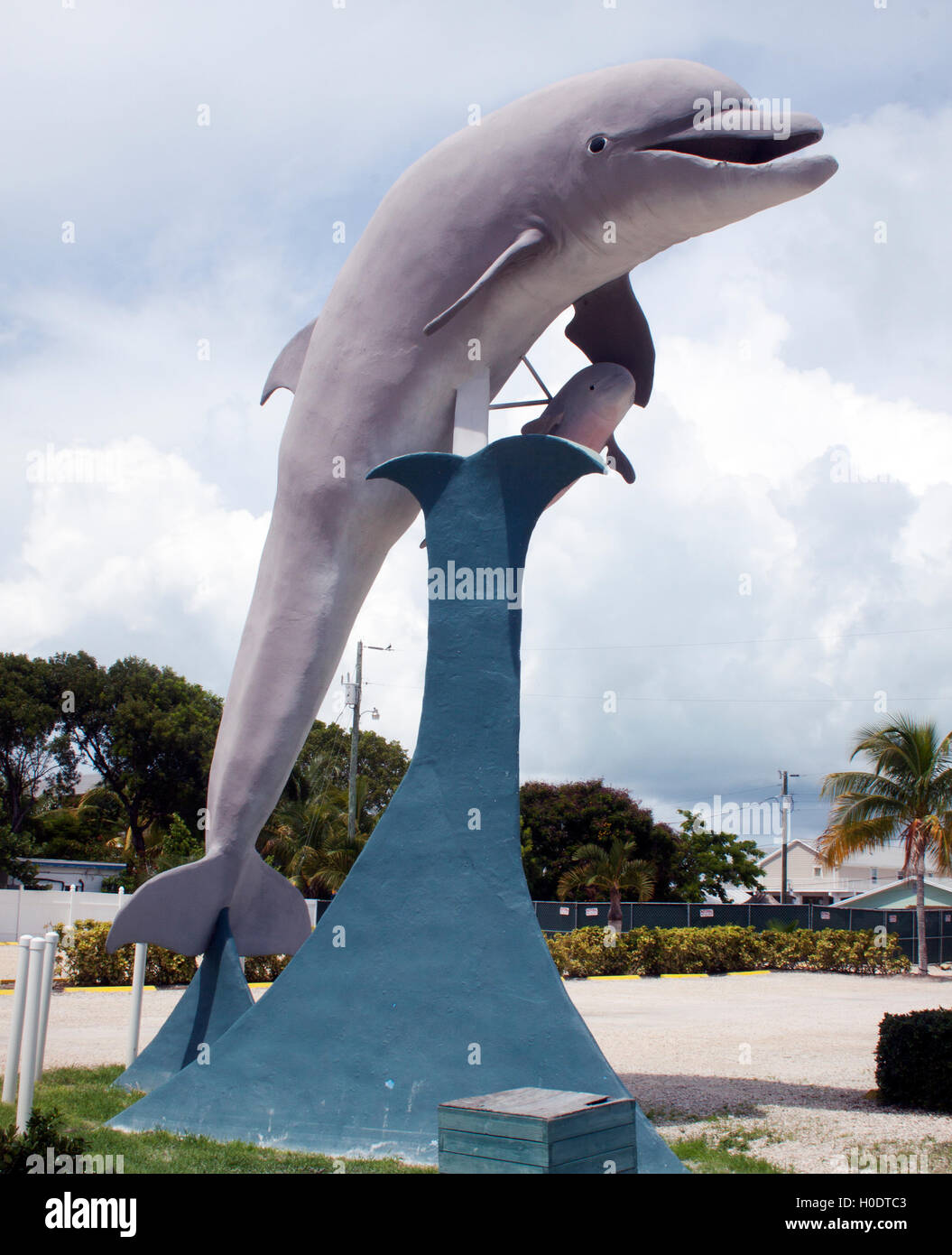 Huge dolphin sculpture in Marathon, Florida Keys, a playful roadside landmark and photo stop celebrating the region’s marine life. Stock Photo
