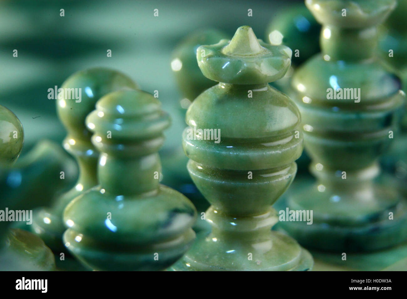 chessboard and alabaster chess on a black background Stock Photo - Alamy