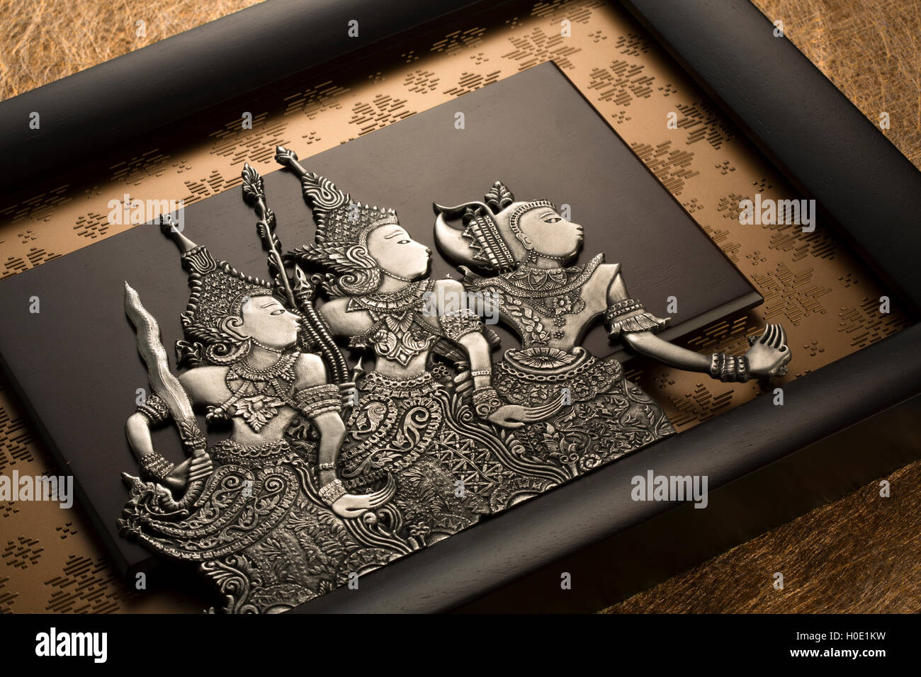 Indonesian plaque featuring three characters from Hikayat Seri Rama ...