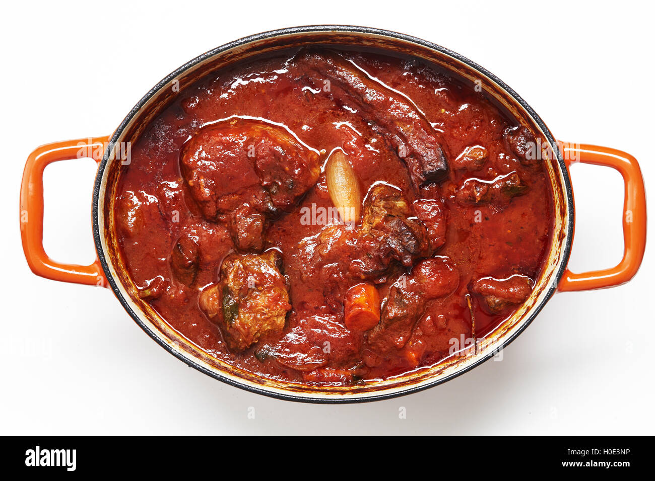 Encyclopedia of food braised beef in tomatoes sauce in stew on white