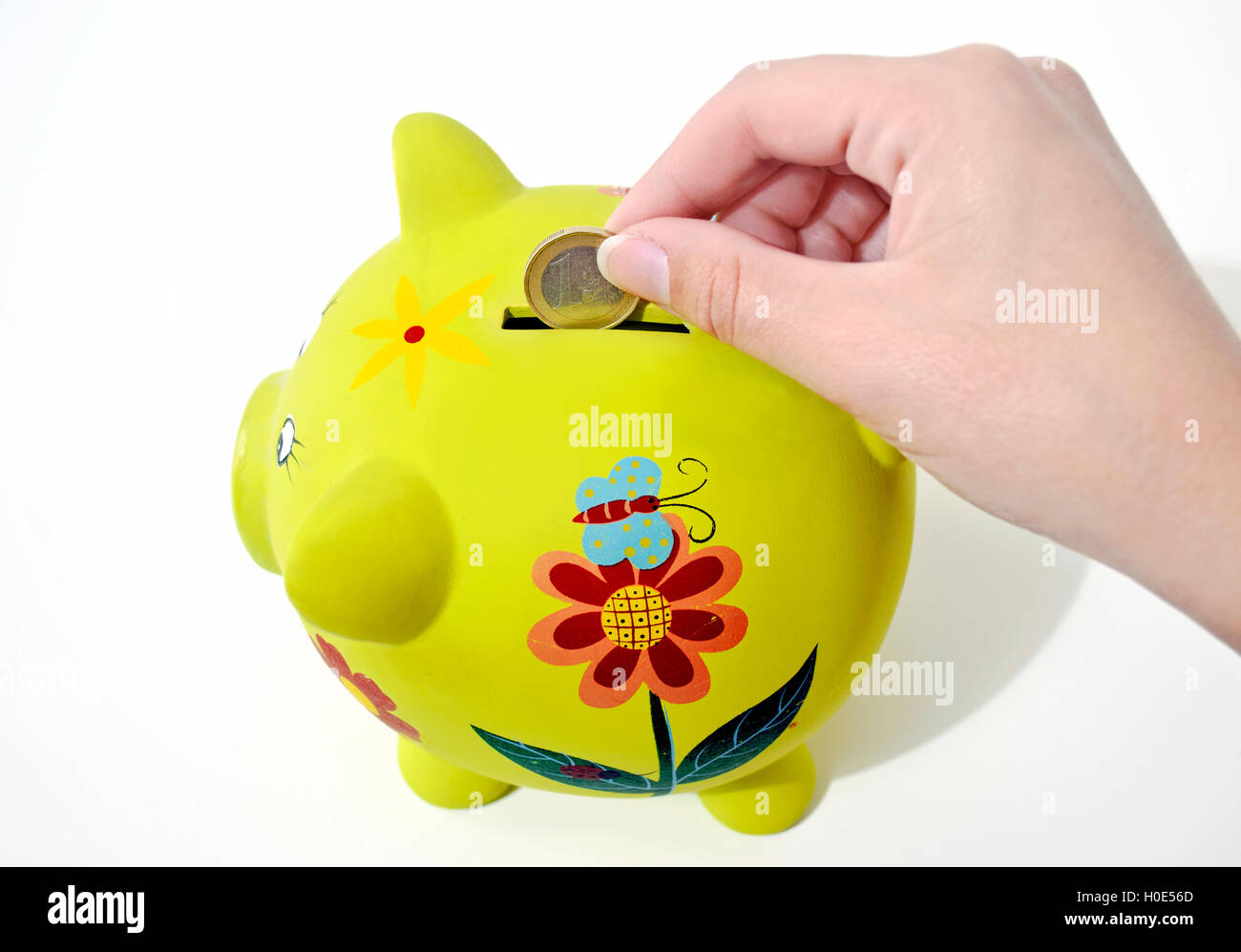 green pig money box - saving money concept Stock Photo