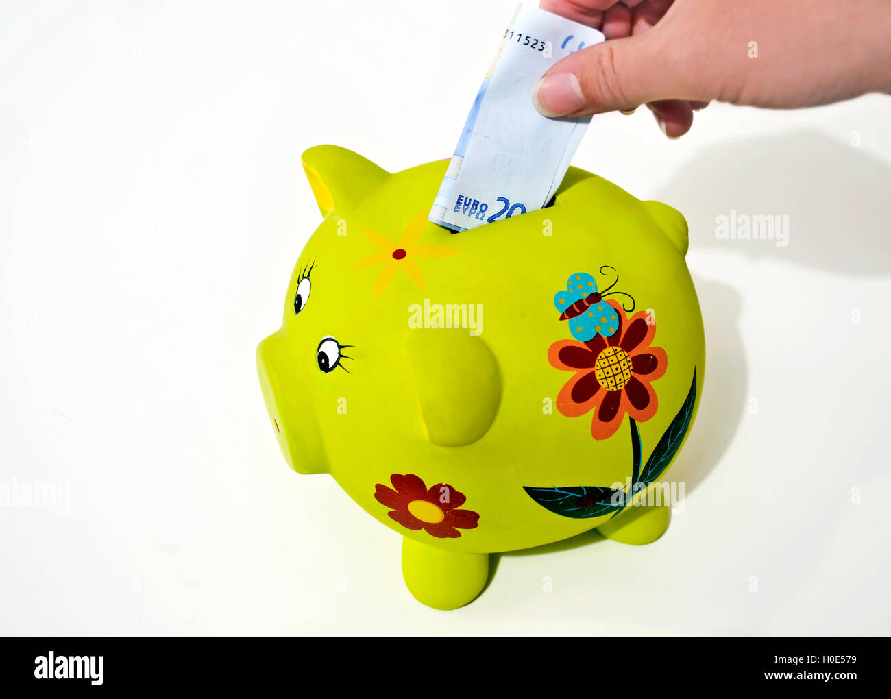 green pig money box -  saving money concept Stock Photo