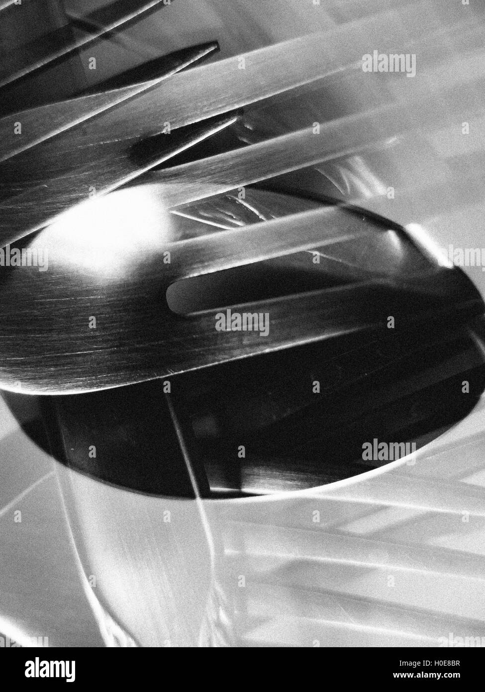 Double exposure in the same frame of forks and spoons Stock Photo Alamy