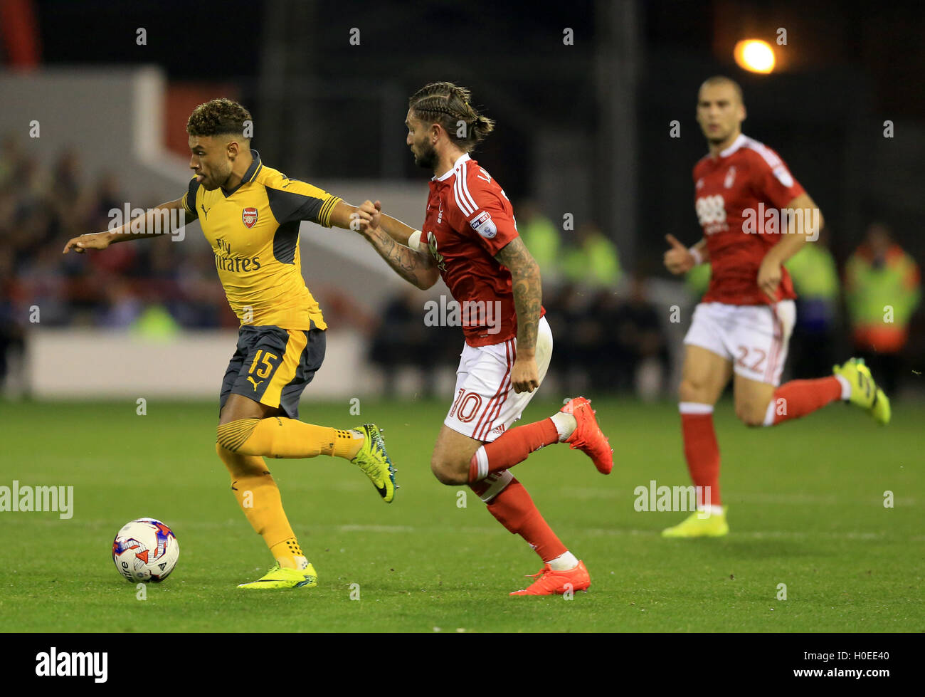 Arsenal's Alex Oxlade-Chamberlain and Nottingham Forest's Henri ...