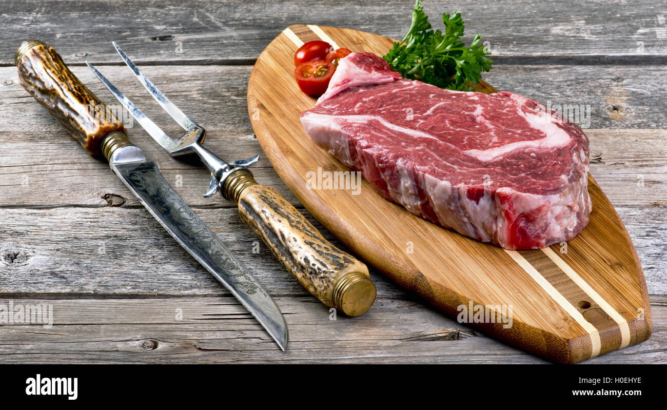 https://c8.alamy.com/comp/H0EHYE/fresh-grilled-rib-eye-steak-ready-to-eat-H0EHYE.jpg