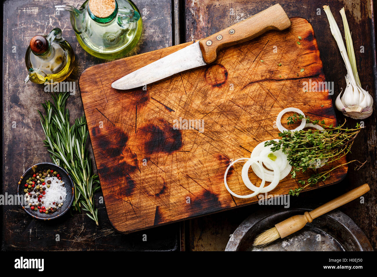 Wooden chopping board background with Seasoning and herbs Stock Photo