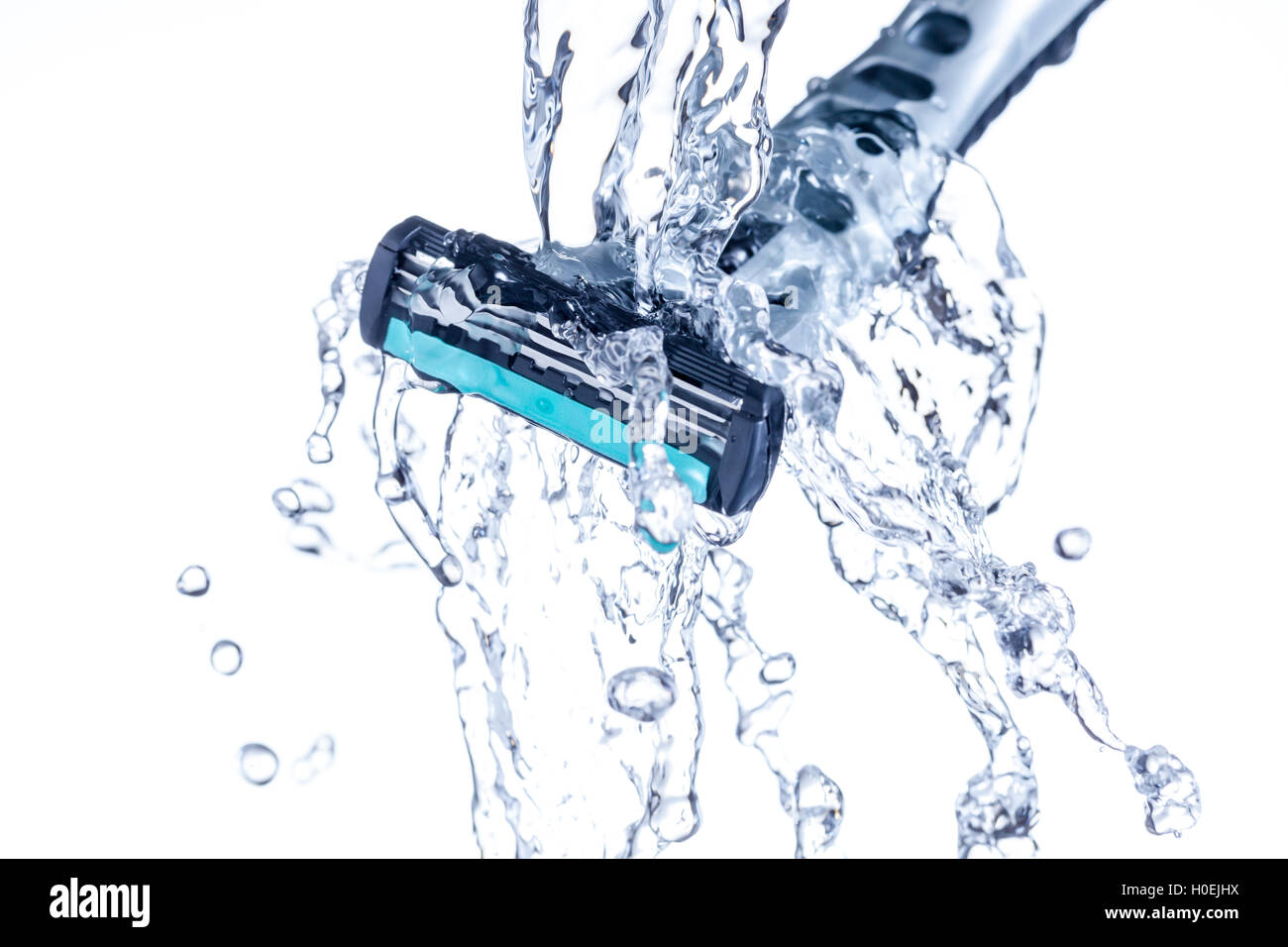 Disposable Razor with water splash Stock Photo Alamy