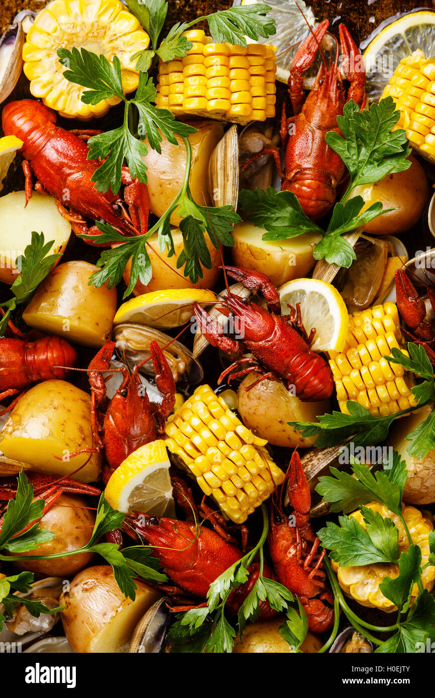 Clambake Seafood boil with boiled Crayfish, Corn on the Cob, Potatoes and Clams Stock Photo