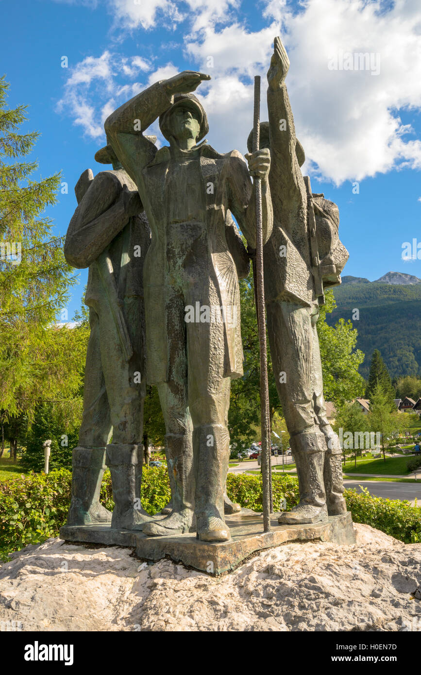 RIBCEV LAZ, SLOVENIA - AUGUST 22, 2016: Four brave men from Bohinj - the first men on Triglav. Statue of Bohinj natives that cli Stock Photo