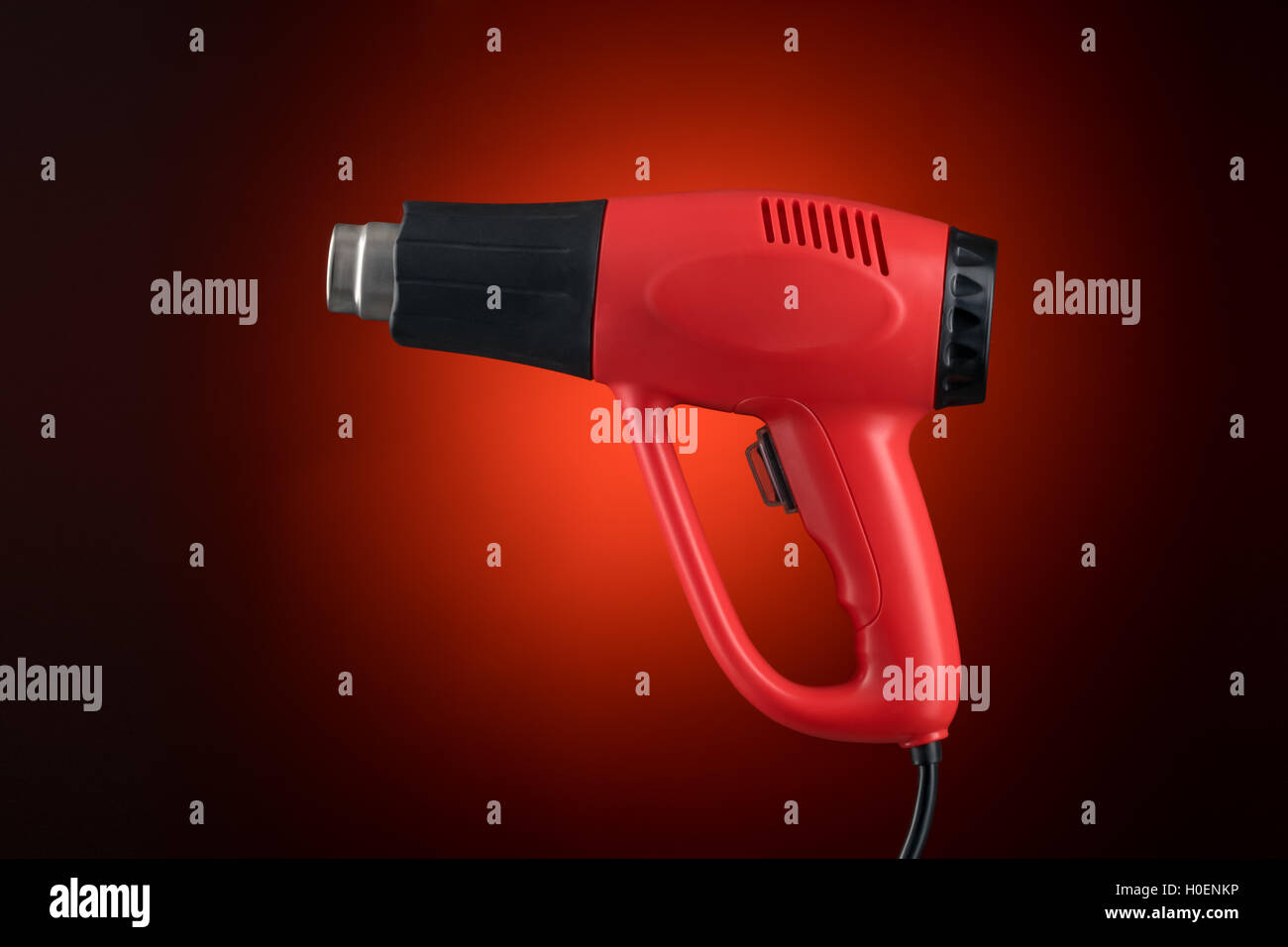 Heat gun isolated without sticker on red background Stock Photo Alamy