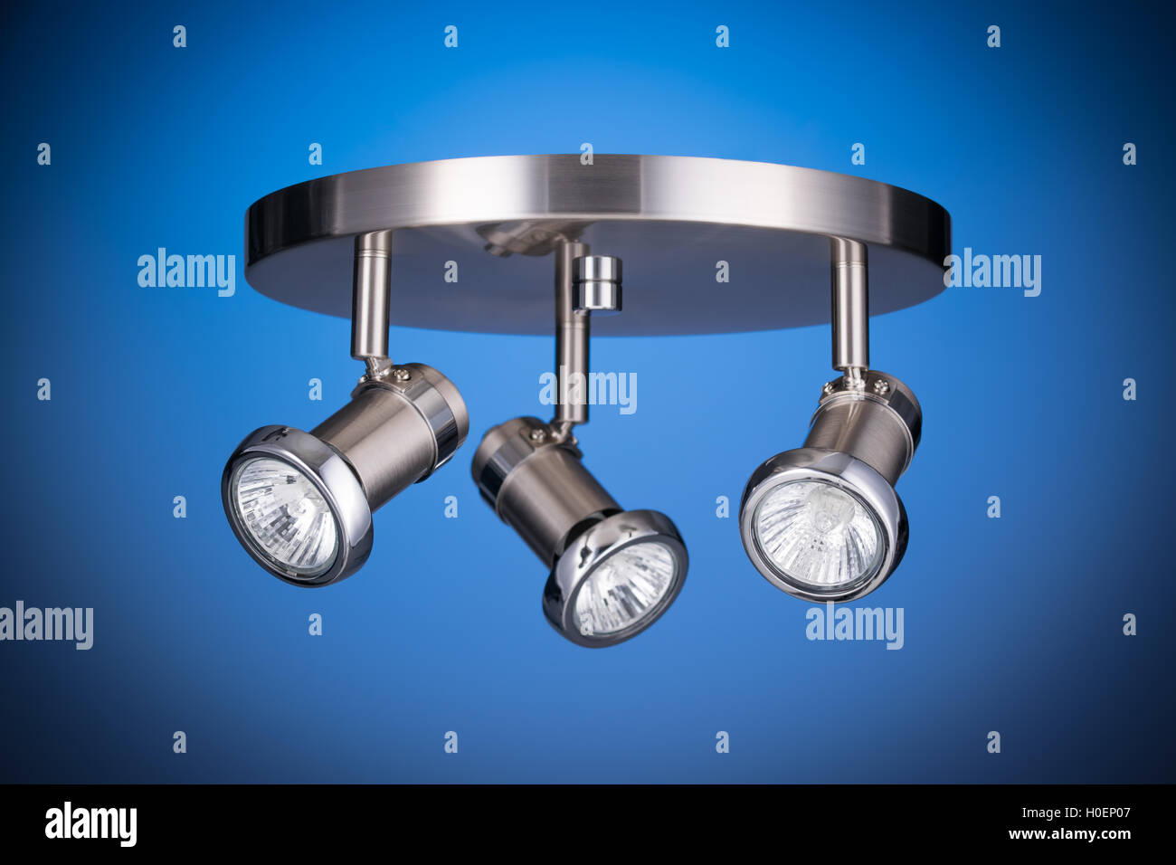 Ceiling light fixture isolated on blue background Stock Photo Alamy