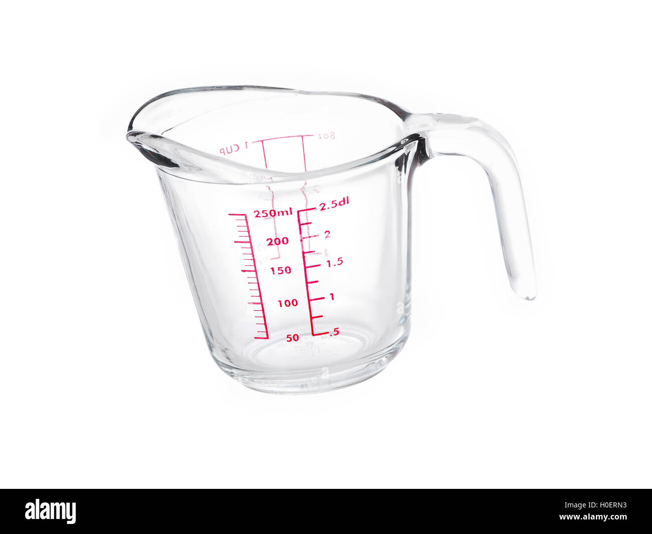 Glass mesuring cup on pure white background Stock Photo
