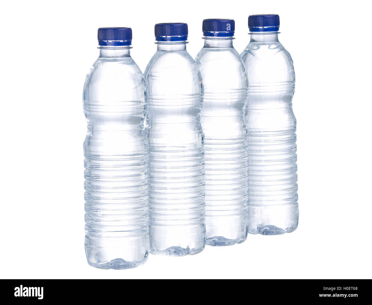 Rows of water bottles isolated on white background Stock Photo
