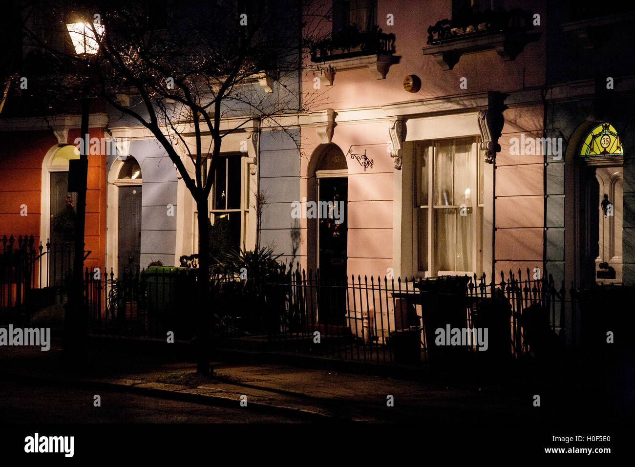 lamplight illuminating, this colourful Pastel Terrace housing homes