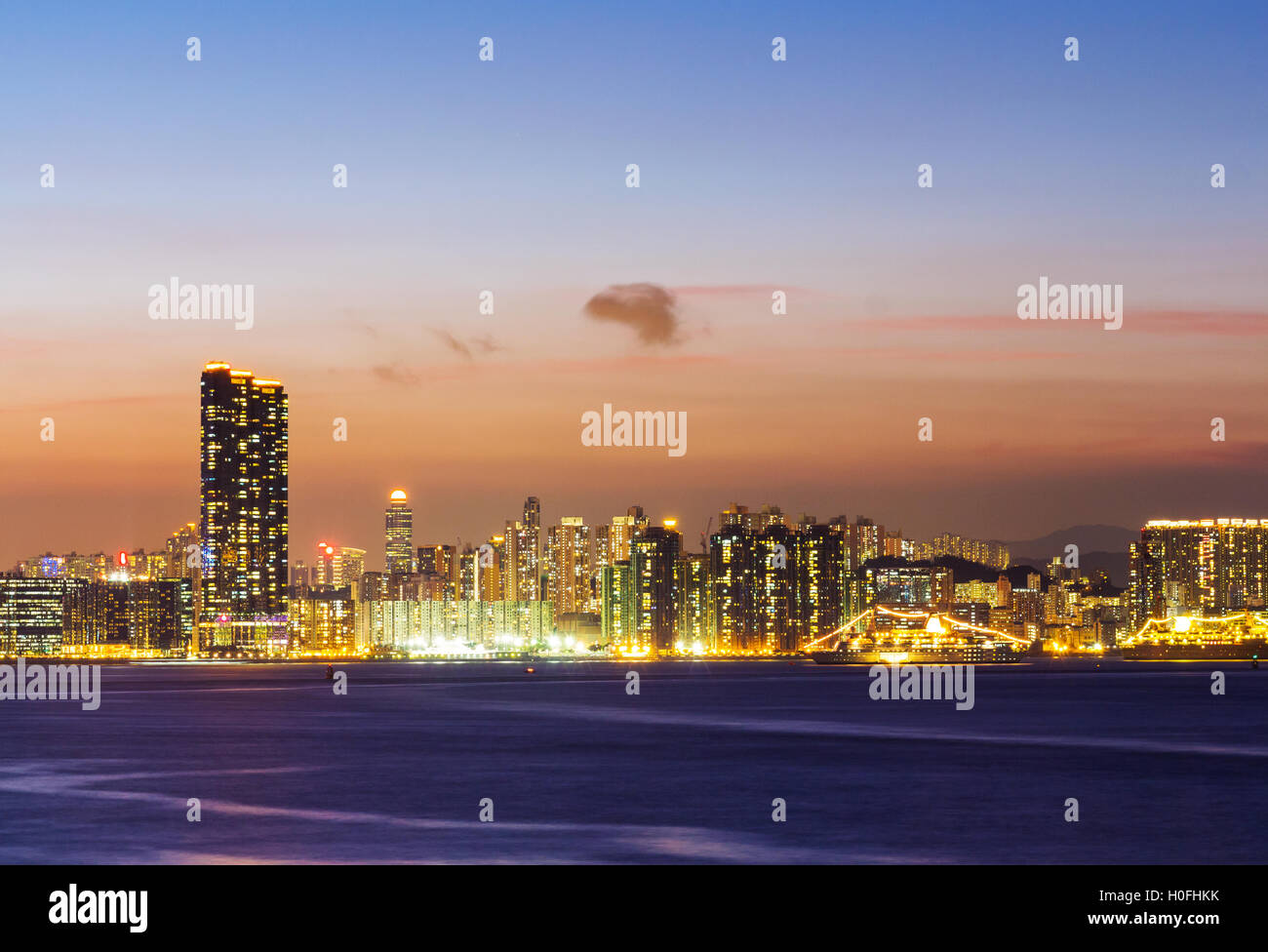 Skyline of Hong Kong at sunset Stock Photo - Alamy