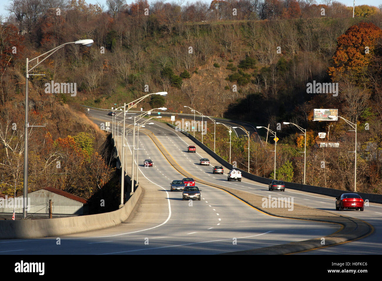 Vehicles crossing bridge over James River in downtown Lynchburg