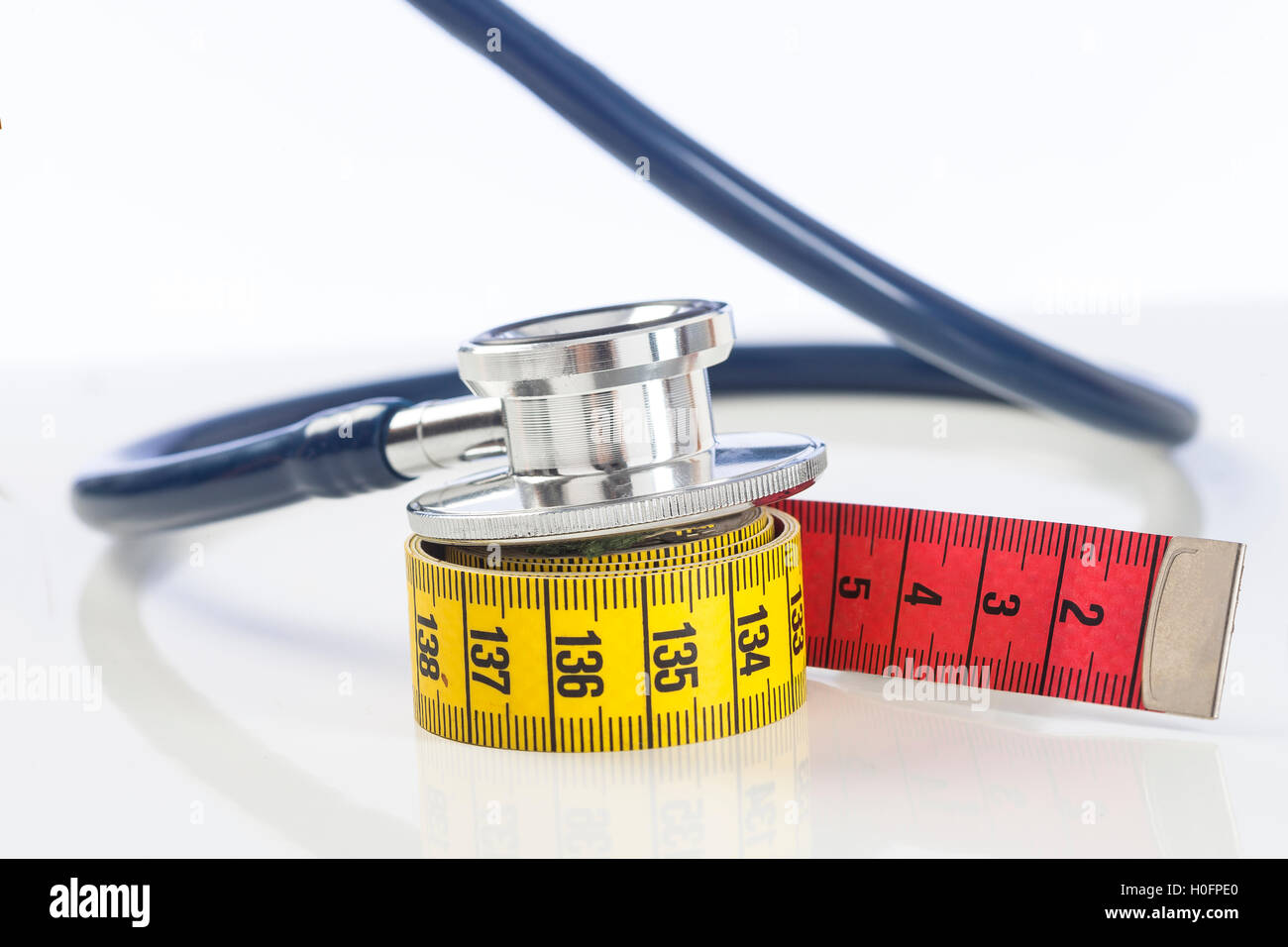 Tape measure with stethoscope Stock Photo Alamy
