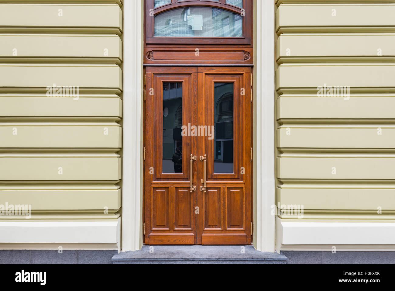 Wooden doors of the old stone house Stock Photo - Alamy