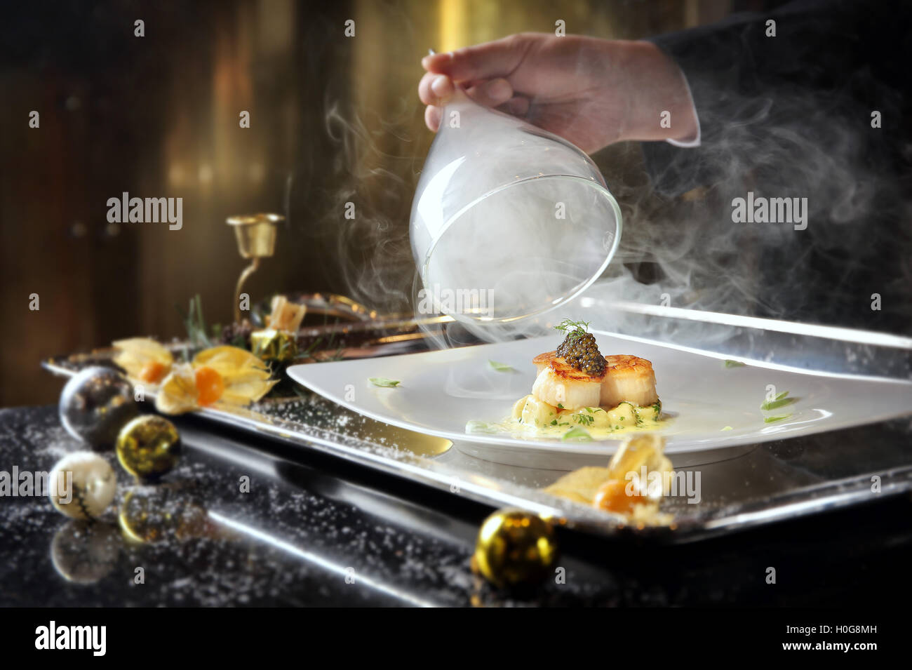 Pan seared diver scallops with smoked potato gnocchi and Oscietra