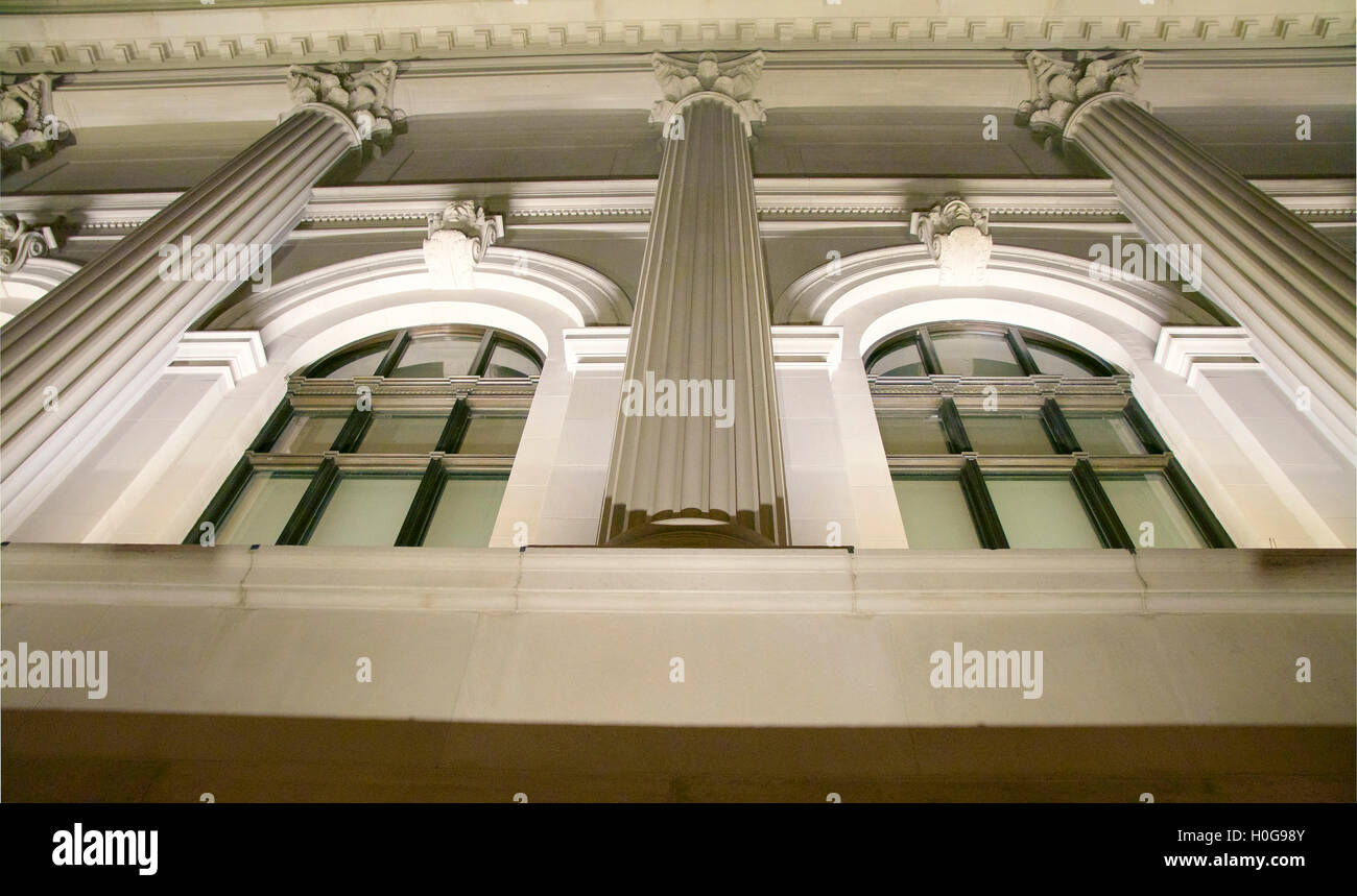 Pillars of Neoclassical Building New York City Elevation Angle at Night with Bottom Lighting Stock Photo