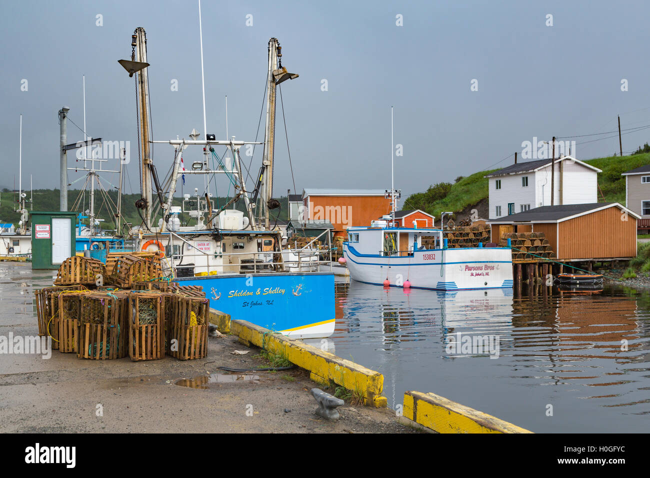 The fishing village and harbour with fishing stages and fishing boats ...