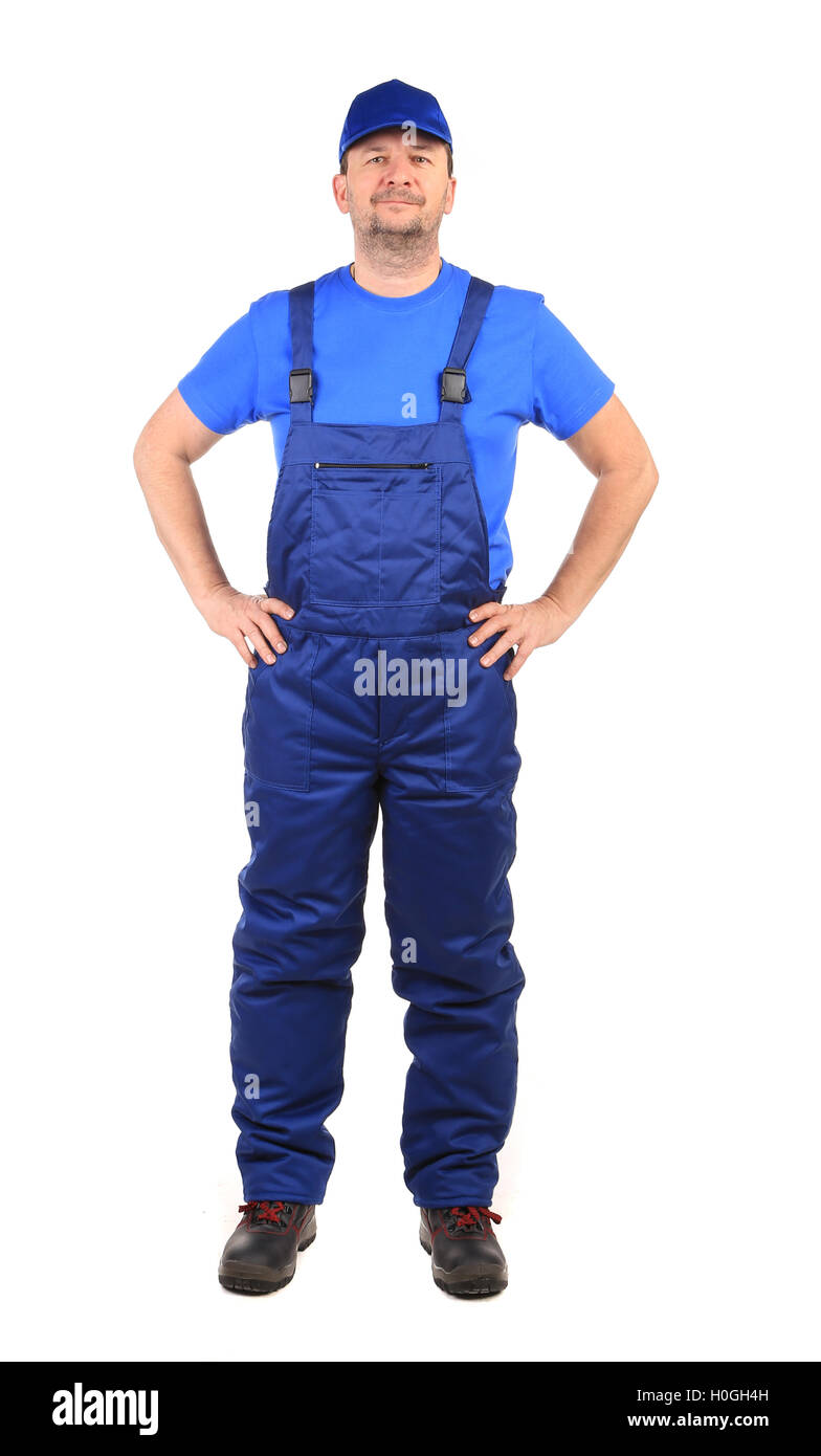 Worker in blue overalls Stock Photo - Alamy