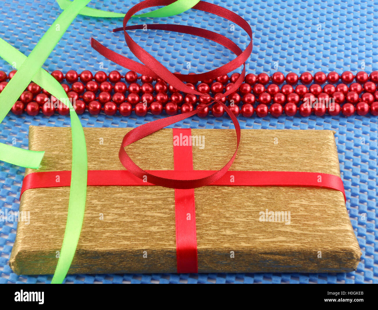 White gift box with red ribbon bow Stock Photo - Alamy