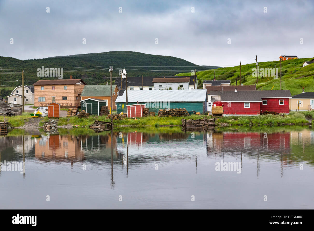 The fishing village and harbour with fishing stages and fishing boats at Trout River
